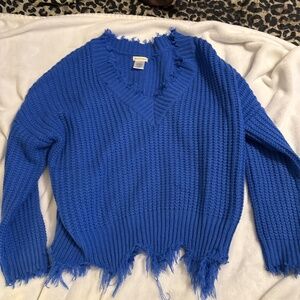 Distressed royal blue bulky cropped sweater.